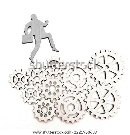 Business system and competition concept. businessman is running on set of cogs. isolated on white background. Business mechanism system. Business people difficult career
