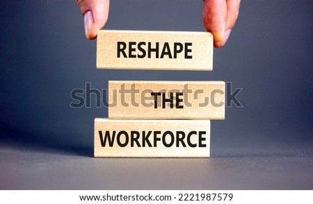 Reshape the workforce and support symbol. Concept words Reshape the workforce on wooden blocks. Businessman hand. Beautiful grey background. Business reshape the workforce quote concept. Copy space
