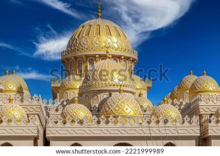 Mosque El Mina Masjid, opened in 2012, monument of expresses the Islamic architecture, the biggest mosque in Hurghada, Egypt. Royalty-Free Stock Photo #2221999989