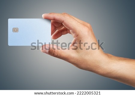 Template of credit card in the man's hand. 