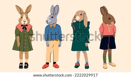 Various anthropomorphic Rabbits. Hand drawn Vector illustration. Cute cartoon creatures standing. Fashion animal characters. Different stylish clothes. Every bunny is isolated. New year symbol Royalty-Free Stock Photo #2222029917