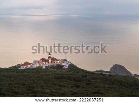 Beautiful landscape of Cape Mondego in Figueira da Foz, Portugal, with the lighthouse in the foreground and the sea in the background. Royalty-Free Stock Photo #2222037251