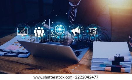 Hand shows the sign and icon of Digital marketing internet advertising and sales increase business technology concept, online marketing, E-business, Ecommerce, Business online. Royalty-Free Stock Photo #2222042477