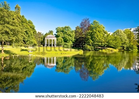 Park de la Orangerie scenic lake in Strasbourg view, Alsace region of France Royalty-Free Stock Photo #2222048483