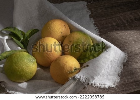 cut yellow lemons with dark background