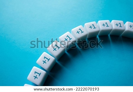 Sequence plus one. Add one more. Power in unity. Gain step by step. Arithmetic progression. Consistent addition, increase and growth. A series concept. Accumulation process. Skill development. Royalty-Free Stock Photo #2222070193