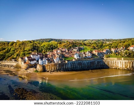 A view of Robin Hood's Bay, a picturesque old fishing village on the Heritage Coast of the North York Moors, UK Royalty-Free Stock Photo #2222081103