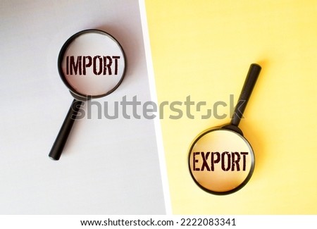 Two glass jars, with the wording, import, export, on top of a banknote. Trade balance concept.