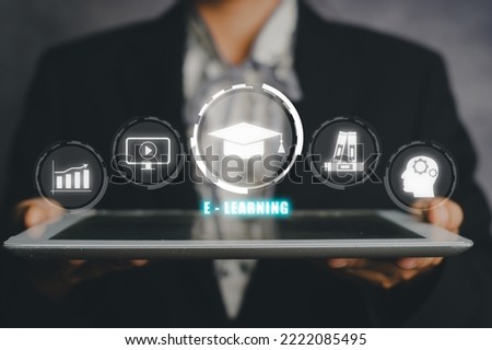 Training online, Education webinar, Person hand working on ldigital tablet with VR screen training online icon background, education on internet, e-learning concept. 