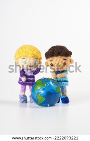 Handmade knitted toy. cute and small Amigurumi doll.SDGs image