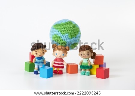 Handmade knitted toy. cute and small Amigurumi doll.SDGs image