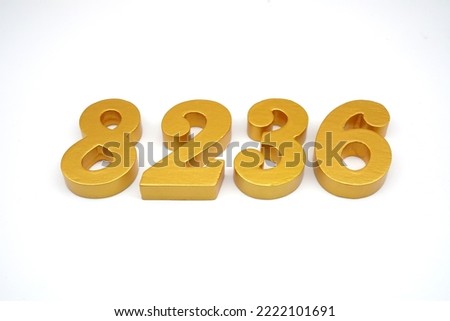   Number 8236 is made of gold-painted teak, 1 centimeter thick, placed on a white background to visualize it in 3D.                                 