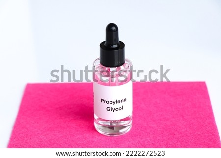 propylene glycol in a bottle, chemical ingredient in beauty product, skin care products Royalty-Free Stock Photo #2222272523