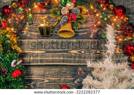 Christmas wooden background with toys and a place to copy.
