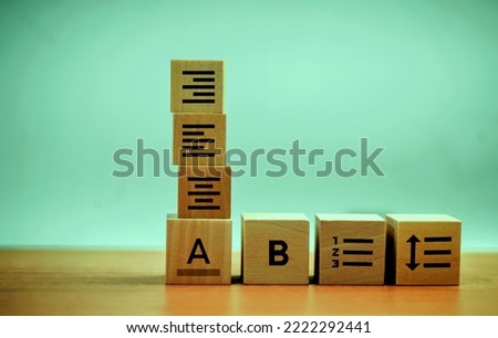 Business paper layout ideas for company growth on the wooden cube block copy space