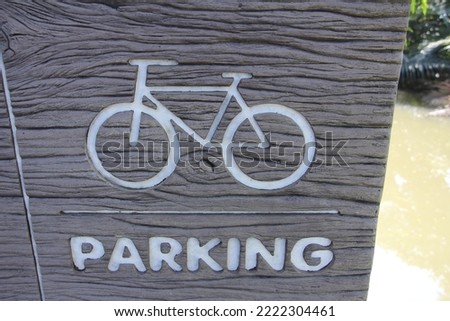 a bike parking area sign