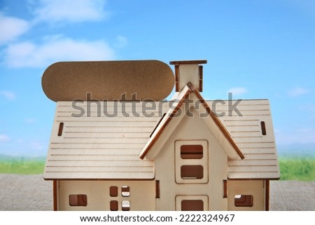 Wooden house models and  advertising signs