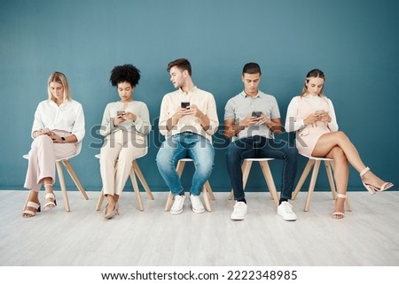 Business people, waiting room and smartphone for job search engine, internet networking and reading email feedback from Human Resources. Diversity group using phone for career, recruitment and hiring