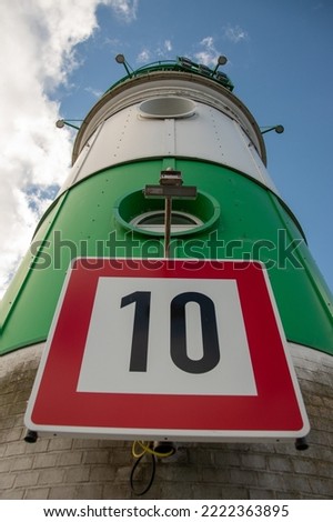famous green and white lighthouse of schleimuende