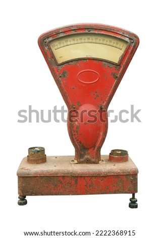 Old red mechanical analog retail scales isolated on white.