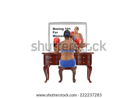 Woman sitting at dressing table with TV screen looking at boxing video isolated on white background