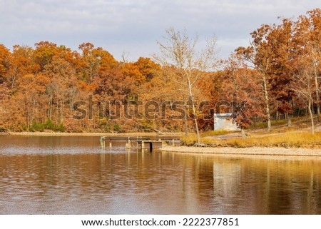 Overcast view of the fall color of a hiking trail in Lake of the Ozarks state Park at Missouri
