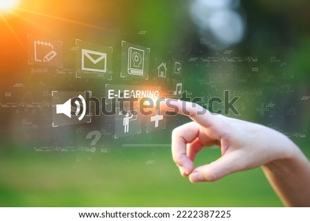 Hand pressing buttons virtual screen on natural green background, e-learning education Internet Technology Webinar Online Courses concept.