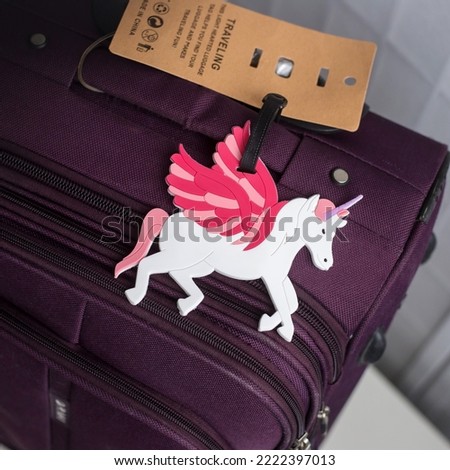 TRAVELING. THIS LIGHT HEARTED LUGGAGE TAG HELPS YOU FIND YOUR LUGGAGE AND MAKES TRAVELING FUN!