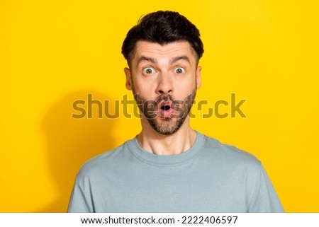 Closeup photo of young funny impressed suprised worker manager brunet man reaction inflation level business crisis isolated on yellow color background Royalty-Free Stock Photo #2222406597