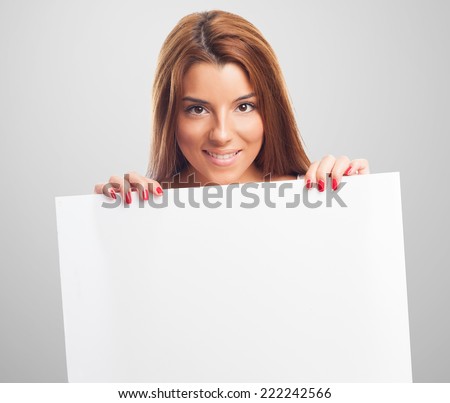 portrait of a beautiful young woman holding a white banner