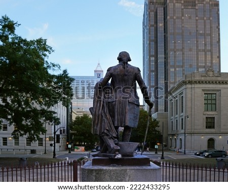 View of Fayetteville St and George Washington statue from the capitol building in Raleigh NC                                Royalty-Free Stock Photo #2222433295
