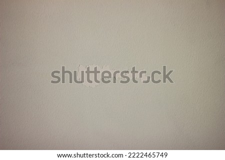 peeling paint on white wall