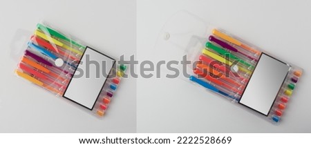 pack of eight colorful pens, set of multicolor ballpoint packet cover with empty label, school and office stationery concept, isolated on gray background Royalty-Free Stock Photo #2222528669