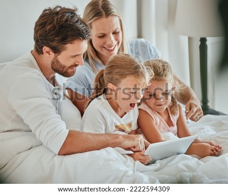 Parents, kids and tablet learning in bedroom, games and watching cartoons on internet, online and relax at home. Happy family of mom, dad and excited children, digital fun and educational app on tech