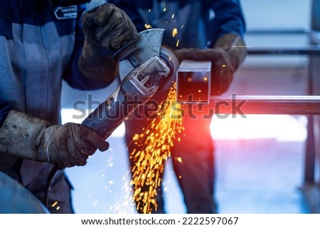 Industrial metal construction sparks. Heavy engineering cutting metal structure.