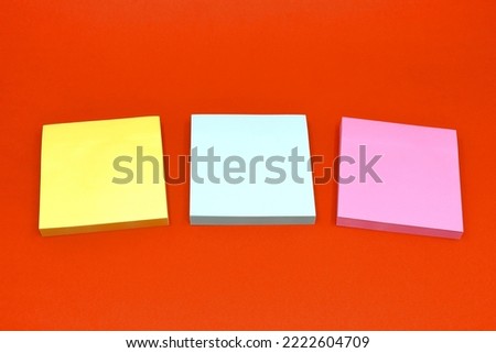 Colored sticky memo notes on orange background