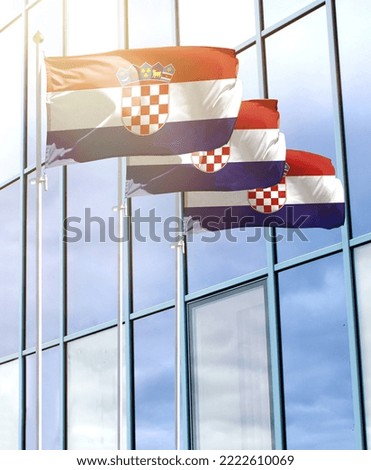 Flagpoles with the flag of Croatia in front of the business center