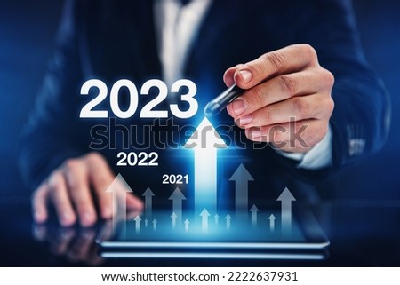 growth of economic indicators in 2023. Concept of business development in the new year Royalty-Free Stock Photo #2222637931