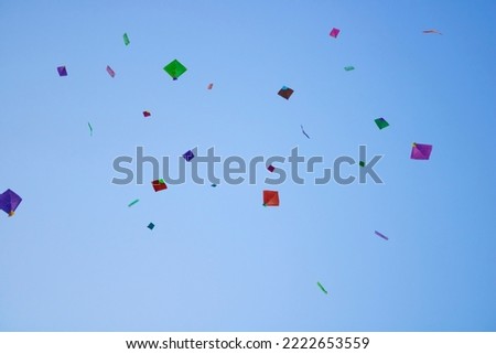 Kites flying on Uttrayan (Makar Sankranti), Ahmedabad, Gujarat, India Royalty-Free Stock Photo #2222653559