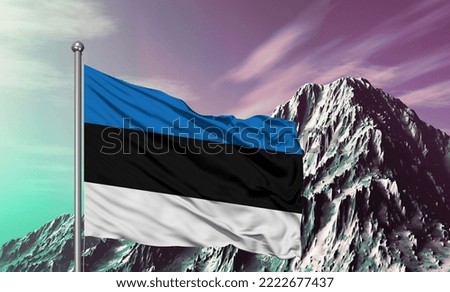 Estonia national flag cloth fabric waving on beautiful mountain background.