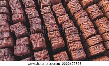 Pallets of bricks for construction. Outdoor storage. Warehousing of large quantities of bricks. Aerial view