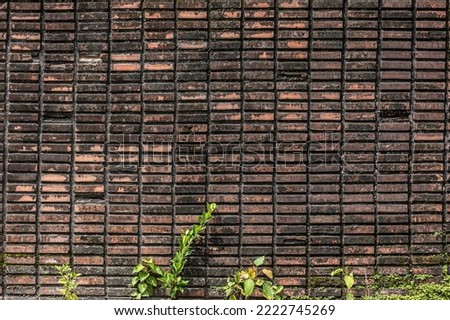 Old wall background with stained aged bricks,vintage brick wall concept.