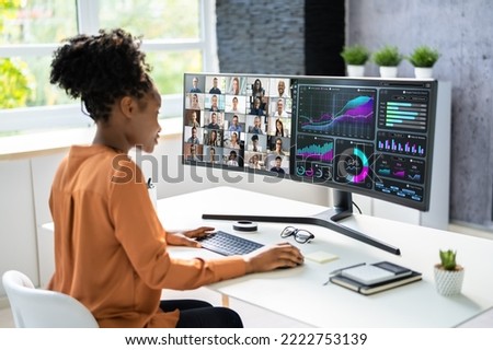 Virtual Telework Webinar And Learning Presentation. African Person Telecommute Royalty-Free Stock Photo #2222753139