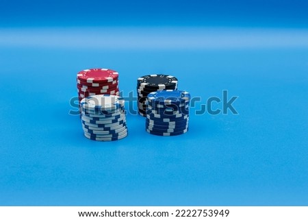 pictures of poker chips on a blue background
