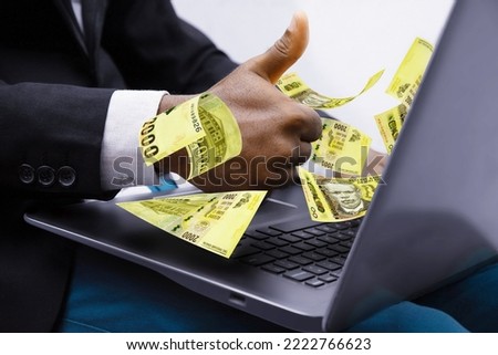 Malawian kwacha notes coming out of laptop with Business man giving thumbs up, Financial concept. Make money on the Internet, working with a laptop