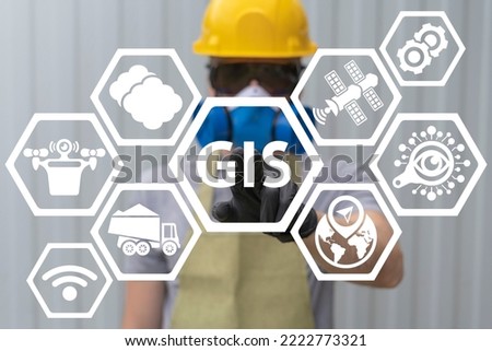 GIS Geographic Information System Industry 4.0 concept. Engineer using virtual touchscreen presses GIS acronym. Royalty-Free Stock Photo #2222773321