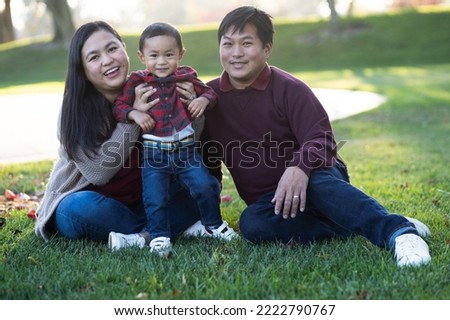 Happy Holiday portrait with Mom, Dad, and Son