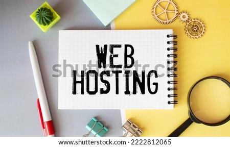 Web hosting business text concept. Text in notebook on table