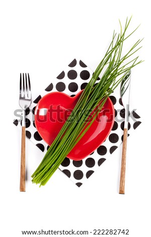 Serving with a plate in the shape of a heart. concept