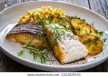 Fish dish - fried halibut with French fries and 